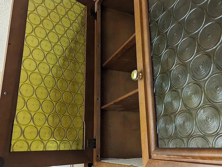 My personal favorite feature of the whole house. These funky green paneled cabinets