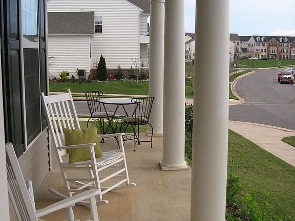 Front wrap porch w/ small town feel