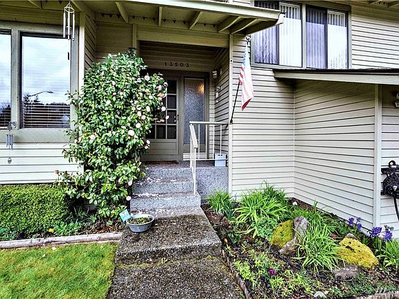 Front Door with flowers in bloom!