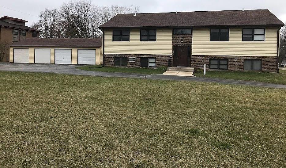 Front elevation, Garage and open space.