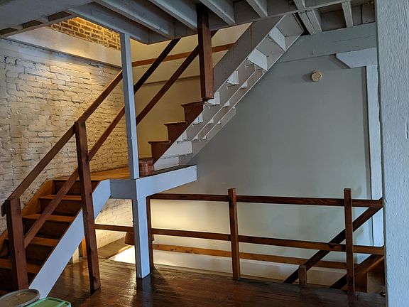 Steps down to the kitchen and up to BR#1