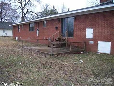 Back of the house with smaller patio.