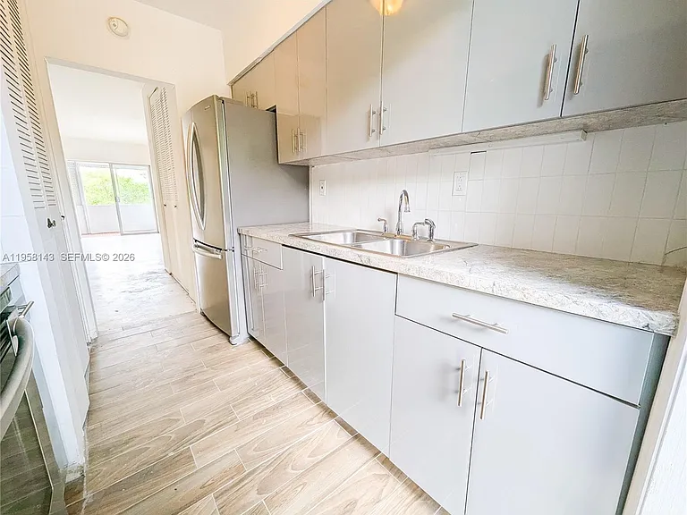 1590 NE 127th St #206 — Photo 3