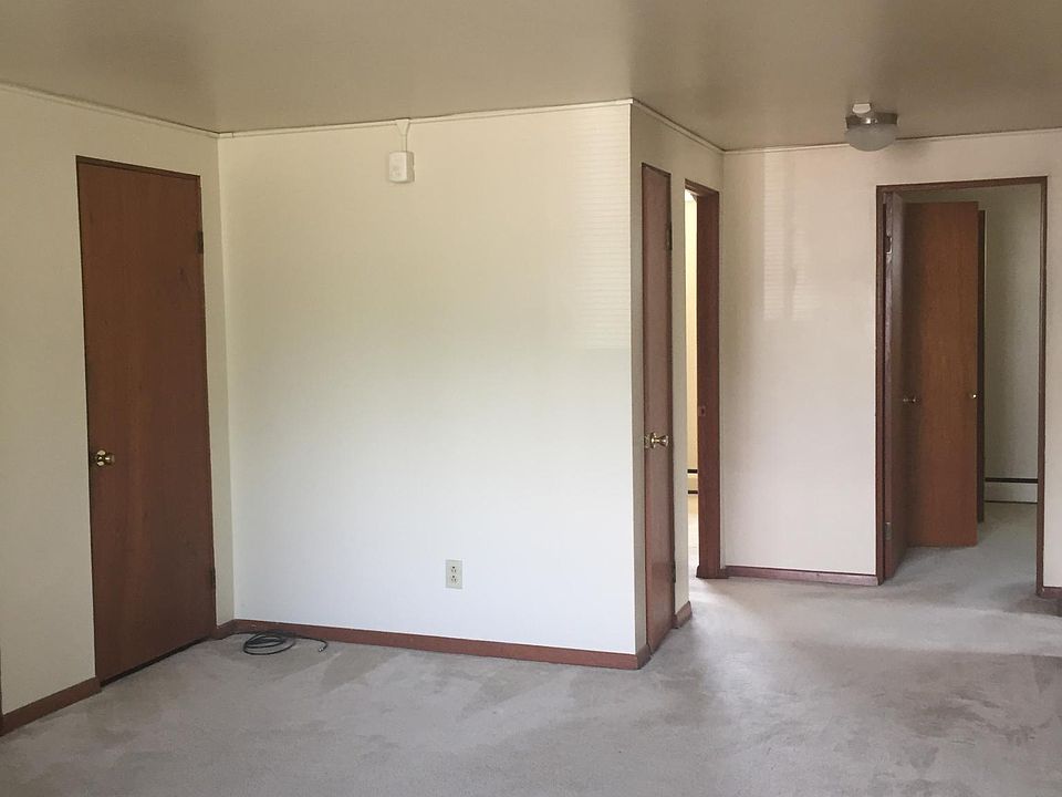 Bright living room with large hall closet.