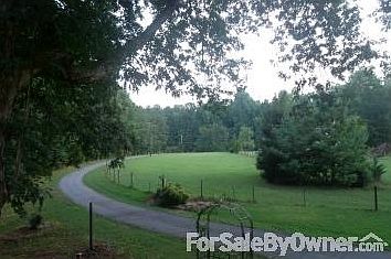 View from the deck
						:
						Long driveway. This shows how your pets and kids are far from the main road.