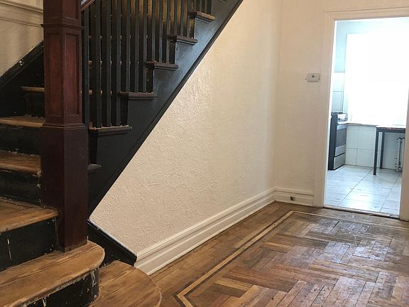 Hallway to kitchen and upper level