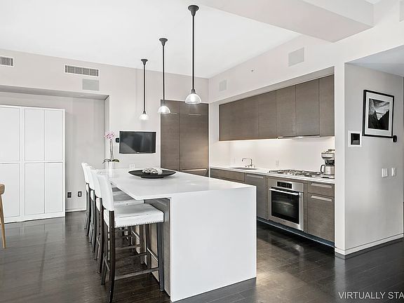 5th image of 515 W 23rd St APT 6