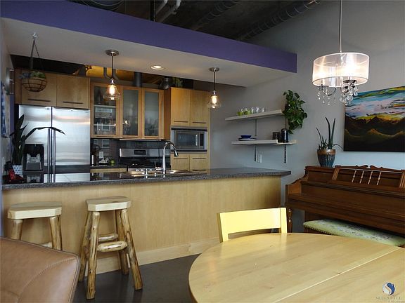Beautiful contemporary design with Granite tile work surface, stainless appliances and a great subme