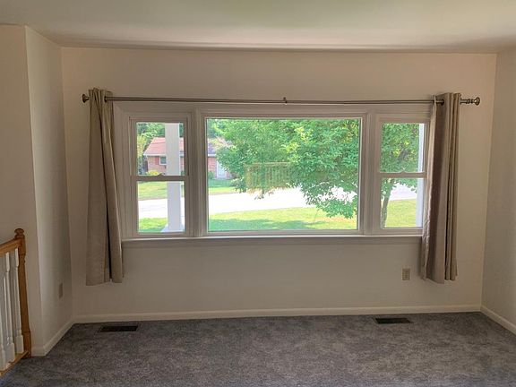 Picture window looking out front of house.