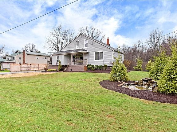 The beauty of this home starts with a stunning landscaping.