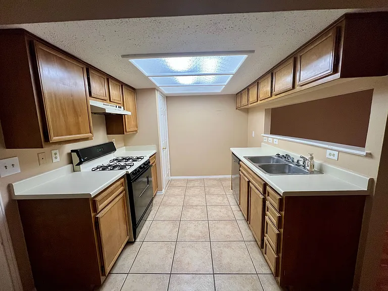 Kitchen that looks into the living room.