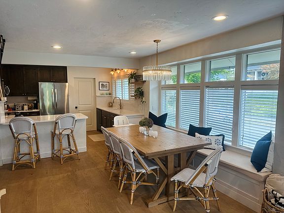 Main Floor: Kitchen & Dining with built in window bench