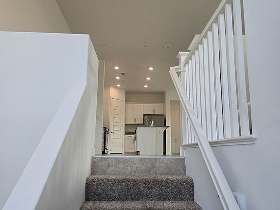 main level with bedroom, bathroom, kitchen, dining room, living room , and private balcony