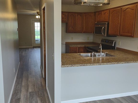 Standing in dining room facing living room
