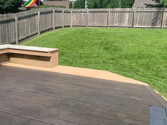 Composite deck w/full fenced backyard