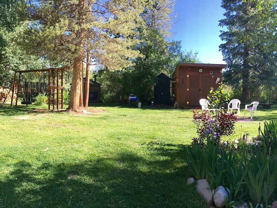 Large yard with pond