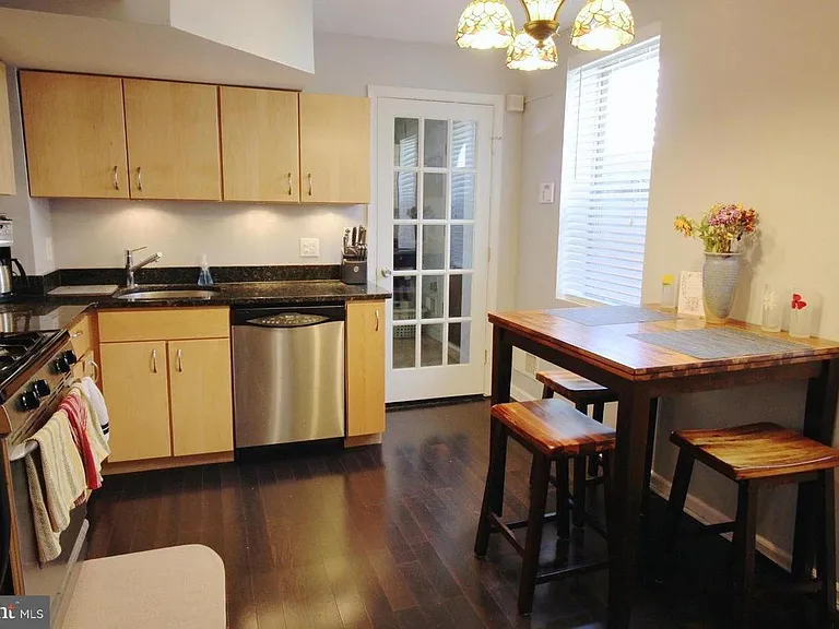 1st Floor: View of the kitchen looking to rear of house.