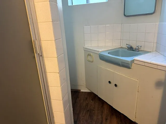 DOWNSTAIRS BATHROOM WITH SHOWER.