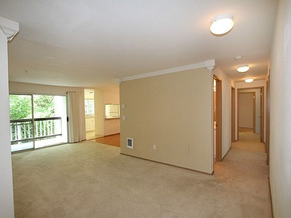 Entry into the spacious living room. Very bright and open.