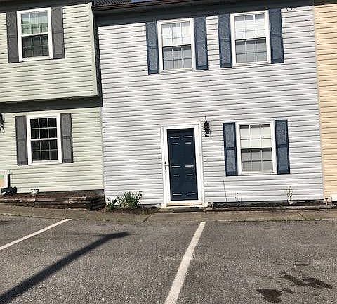 2 dedicated parking spots in front of townhome