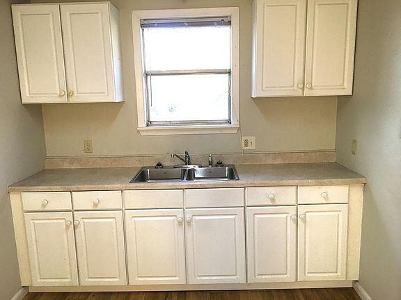 Bring your own fridge and stove for a rent discount. New sink and flooring in the kitchen makes clean up a snap