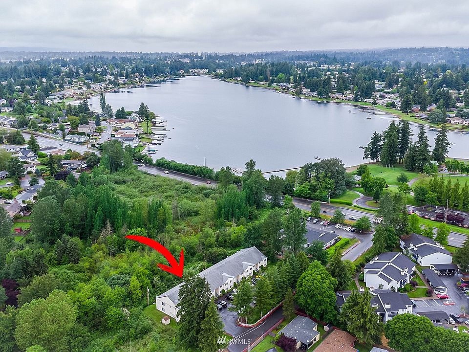 Walking distance to Lake Meridian Park & backs up to green belt!
