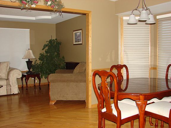 Formal dining room over looks pool