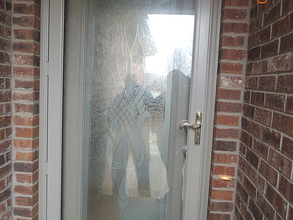 Front storm door