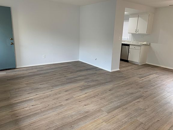 Another view of living room toward kitchen