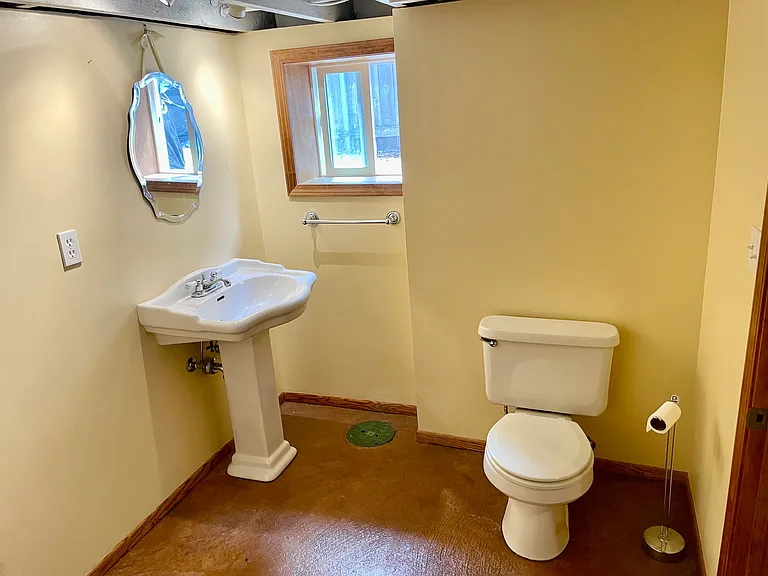 Half bathroom in basement.