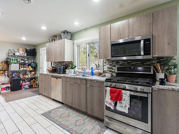 5th image of 6533 Ponderosa Dr NW