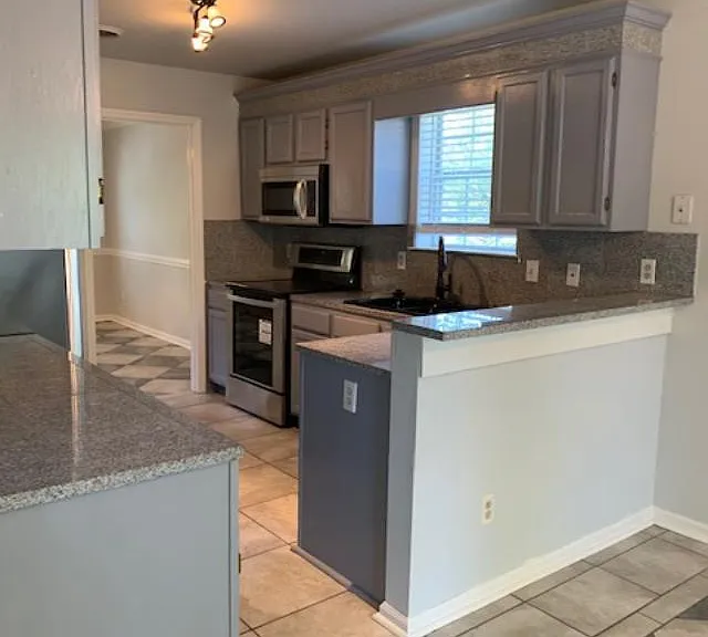 View of kitchen and bar