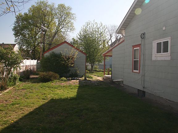 Large side yard and garage