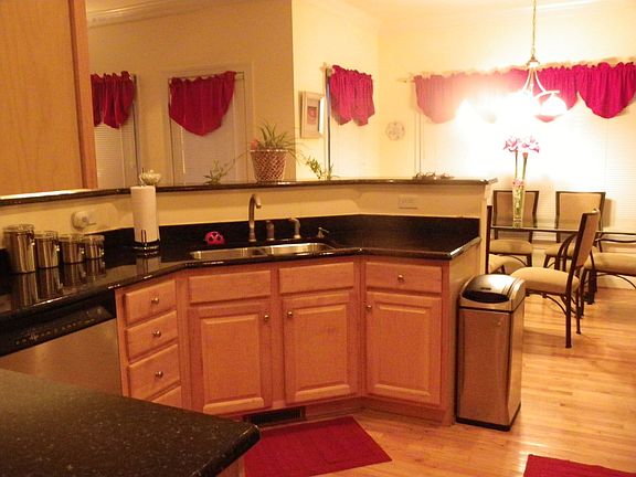 KITCHEN WITH LOTS OF CABINETS, GRANITE COUNTER TOPS