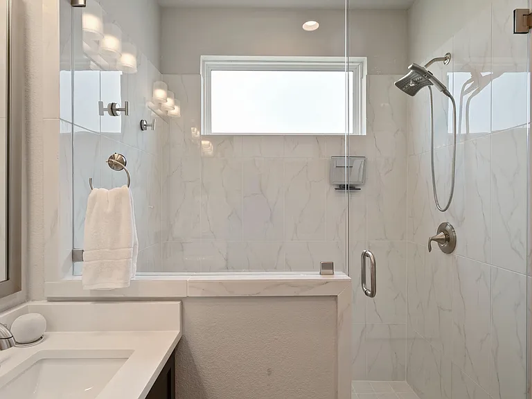 Large walk-in shower in primary bathroom