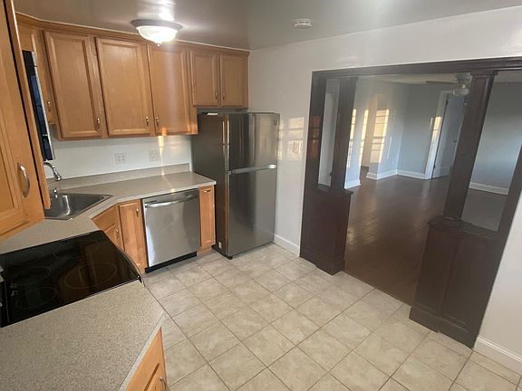 Kitchen with stainless steel appliances.