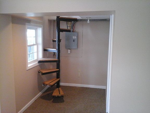 Spiral staircase to upstairs