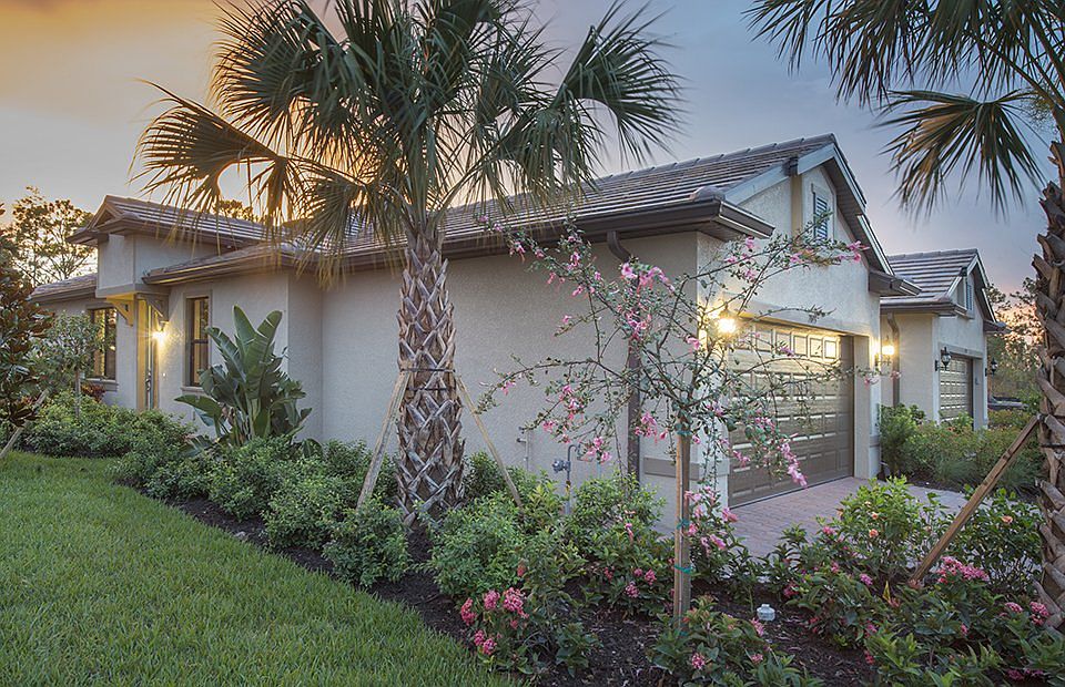 The Serenity, a single-story villa home with a 2 car garage, shown with Home Exterior LC1A