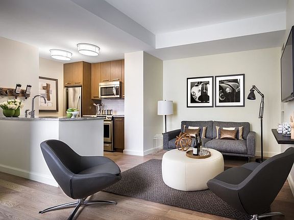 Light-filled living and dining areas are impeccably finished with the finest features.