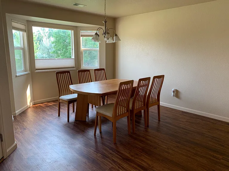 Generous dining space great views from bay windows