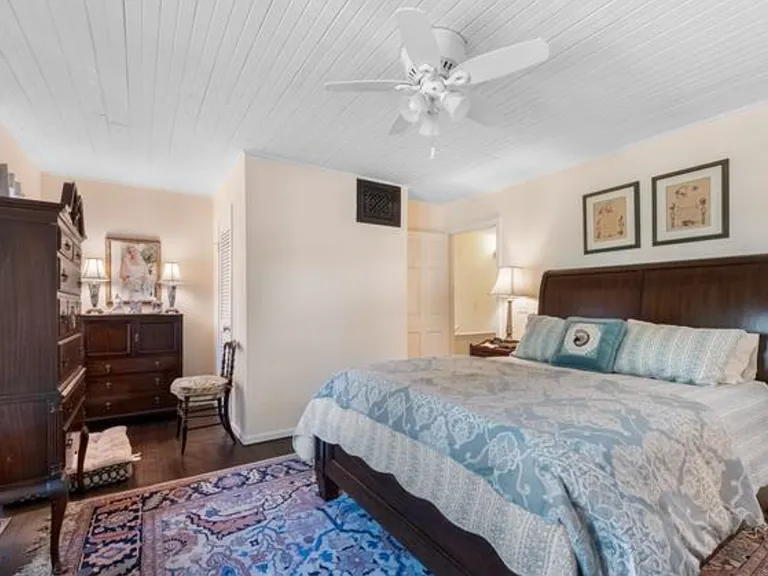 Top floor bedroom with Bay Window, private bathroom, and small private balcony