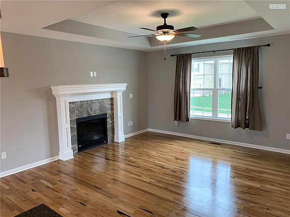 Wonderful great room with hardwood floors and a fireplace