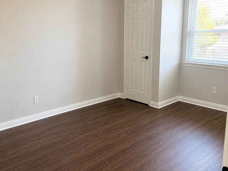 Second bedroom with two closets and ample storage