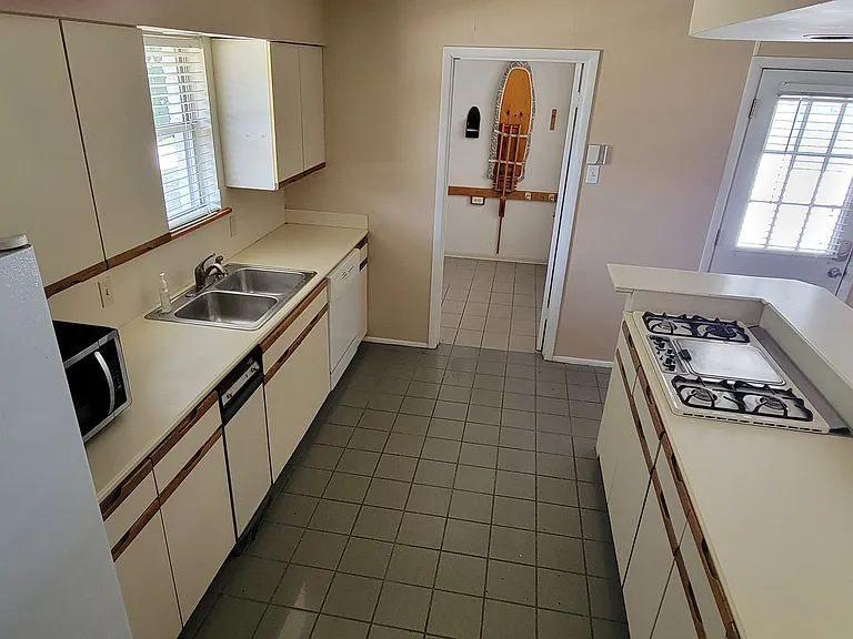 Kitchen with Laundry Room / Pantry in the background