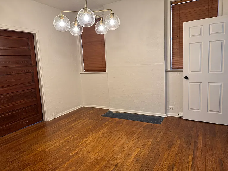 Standing in dining room, with pocketdoor closed between living and dining rooms.