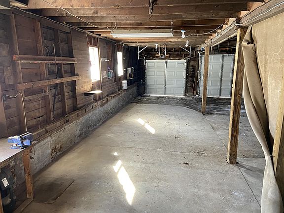 Deep one-car garage on the left side. Area leads straight in to the mud room for easy access inside.