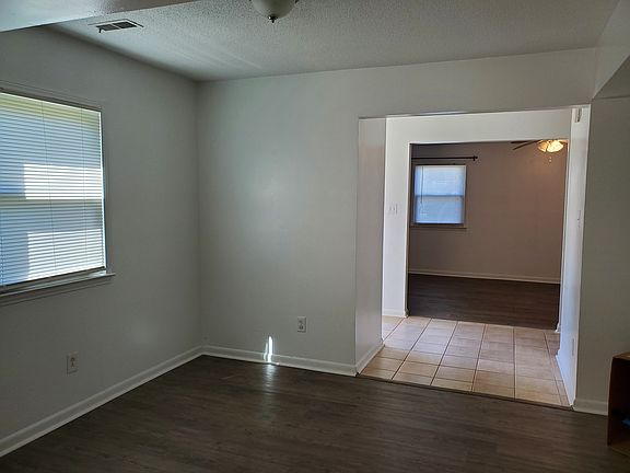 View of Entry Way and Living Room.