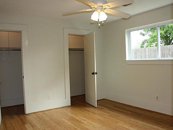 Beautiful bamboo floors, tall baseboards and a large closet really make this bedroom stunning!