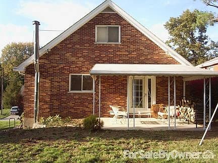 View from Street
						:
						Landscaped and Shaded with two large trees (Blue Spruce)
