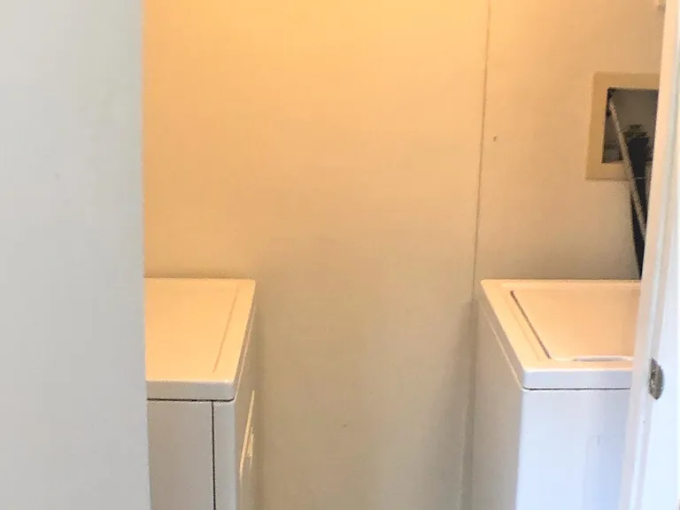 Full size washer and dryer in laundry room
